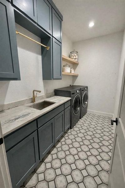 Stylish Tile, Cabinetry and sink.