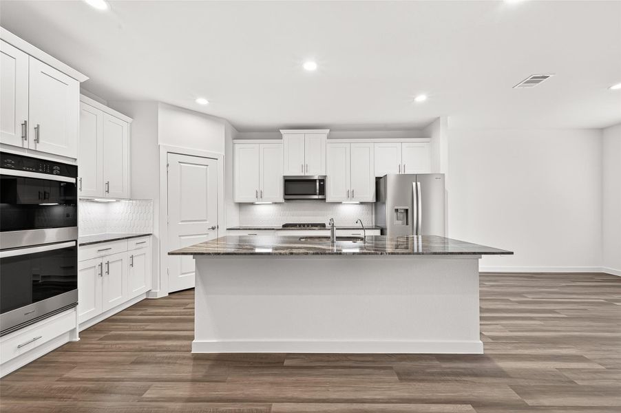 Furnished interior view inside a new home in Harvest Green, Richmond (Image 8).
