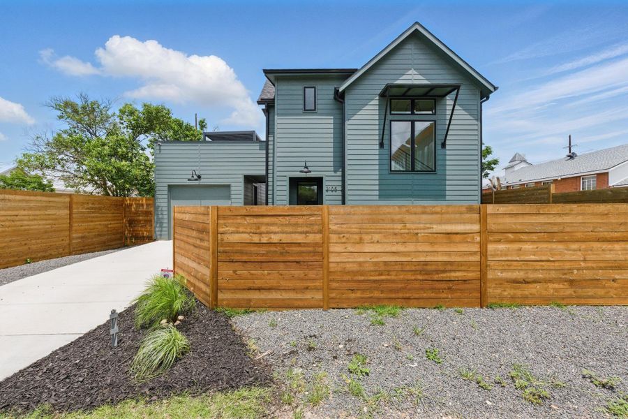 Front exterior of a new home in , Austin, TX, highlighting curb appeal (Image 21). Front exterior of a new home in , Austin, TX, highlighting curb appeal (Image 21).