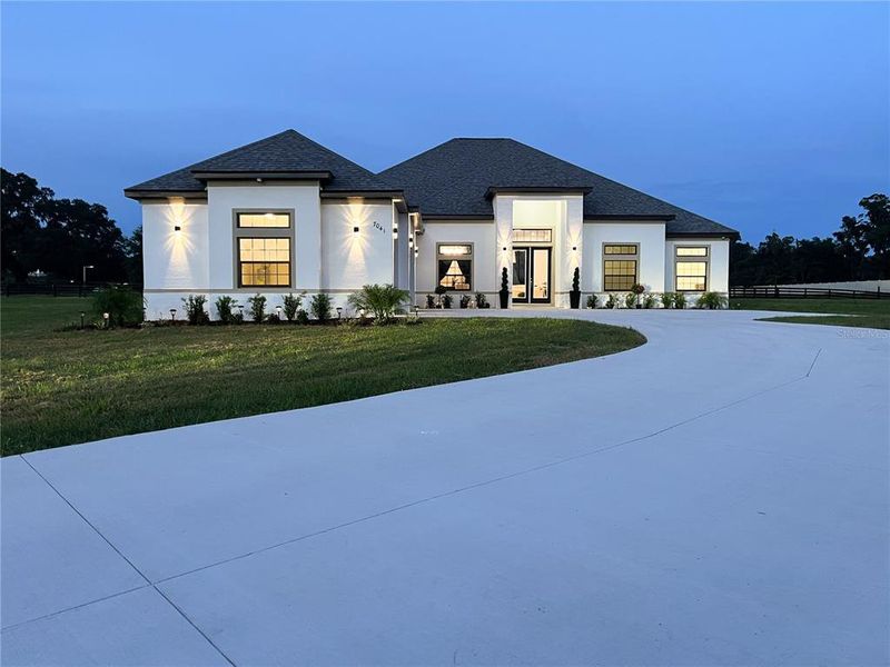 Front exterior of a new home in , Ocala, FL, highlighting curb appeal (Image 27).