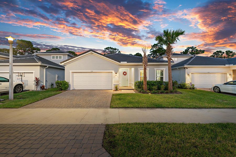 Front exterior of a new home in Banyan Bay, Stuart, FL, highlighting curb appeal (Image 32).