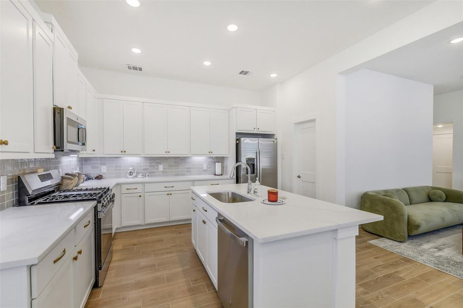 Furnished interior view inside a new home in , Cypress (Image 12).