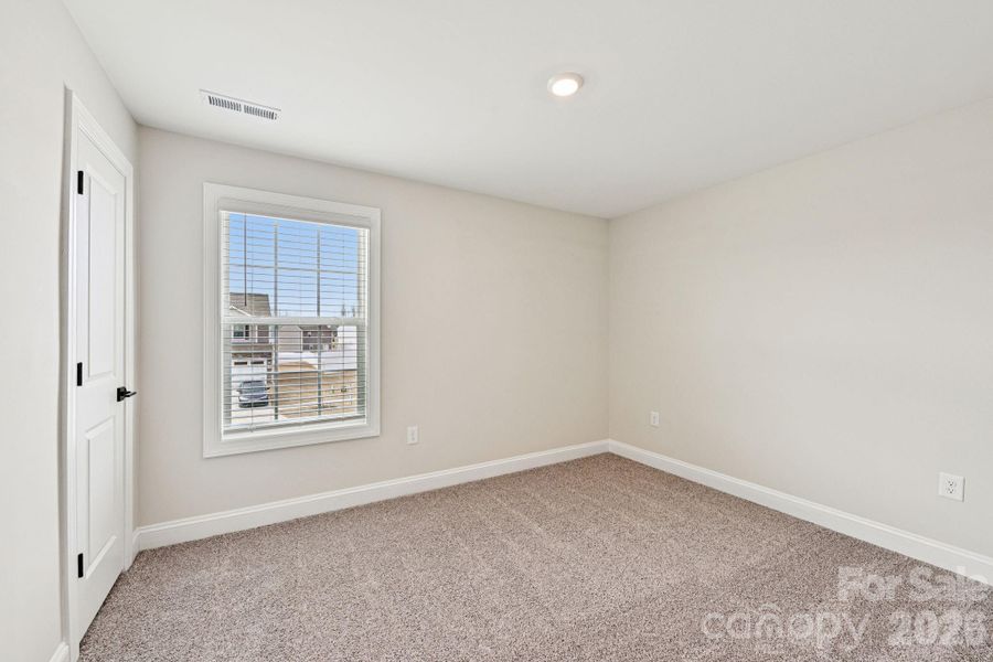 Spacious, unfurnished interior of a new home in Colonial Crossing, Troutman (Image 22).