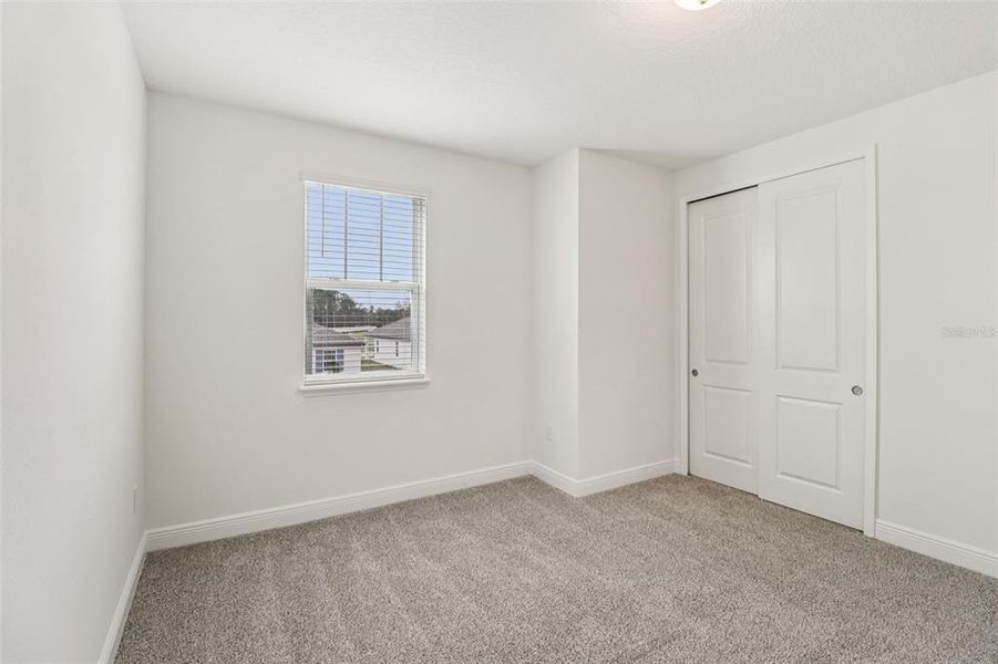 Spacious, unfurnished interior of a new home in Legends Preserve - Signature Series, Daytona Beach (Image 38).