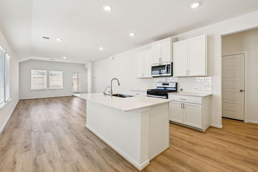 Furnished interior view inside a new home in Granger Pointe - Traditional Series, Conroe (Image 6).