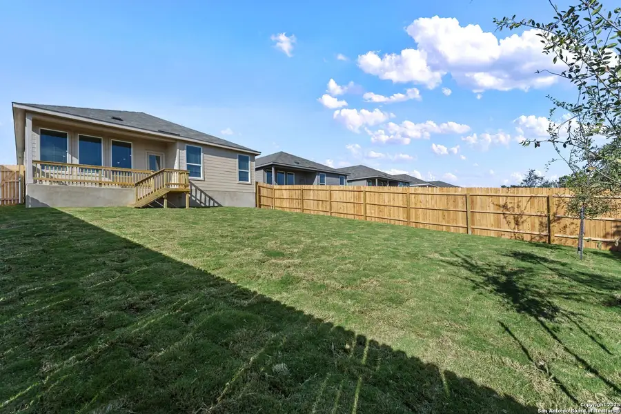 Exterior details and patio area of a home in Waterwheel: Coastline Collection, San Antonio (Image 2).