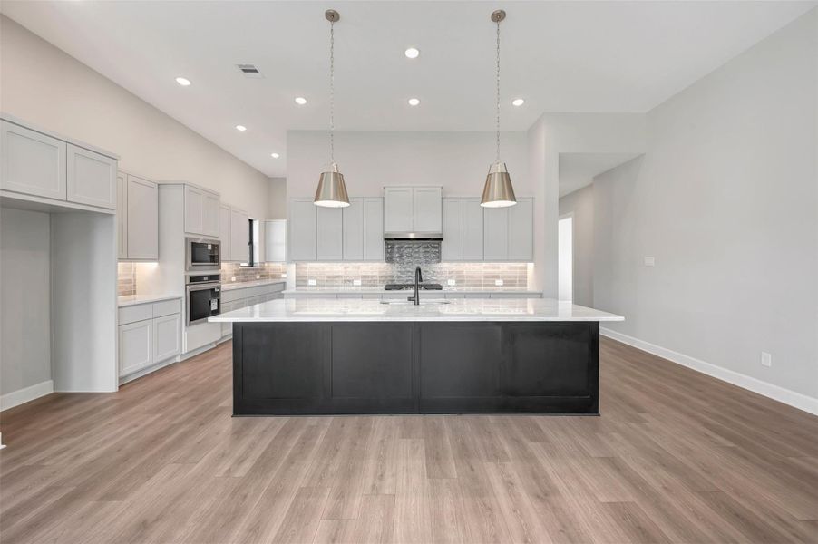 Furnished interior view inside a new home in The Highlands Encore - Tranquil Collection, Porter (Image 3).