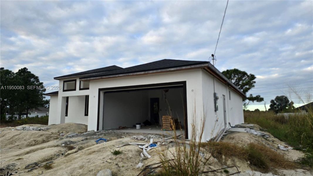 In-progress construction of a new home in , Lehigh Acres, FL (Image 18).