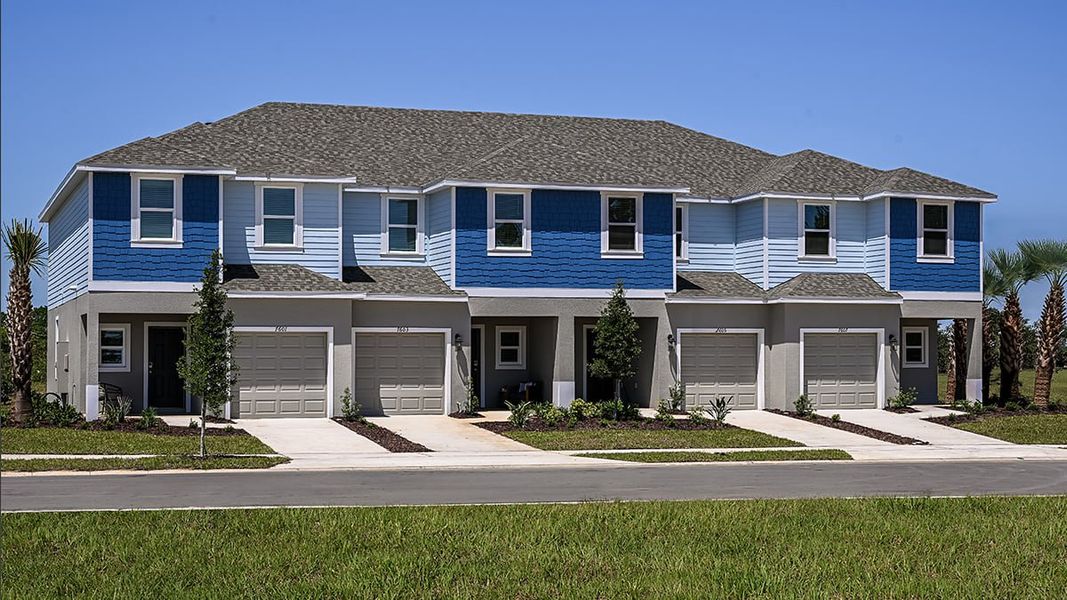 Representative exterior photo of a completed home built from the Jasmine by Taylor Morrison in The Towns at Skye Ranch, Sarasota, FL (Image 1).