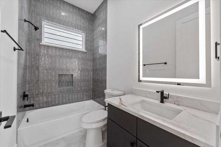 Secondary Bath: Custom Vanity with LED and heated mirror. Tile to the ceiling! Secondary Bath: Custom Vanity with LED and heated mirror. Tile to the ceiling!