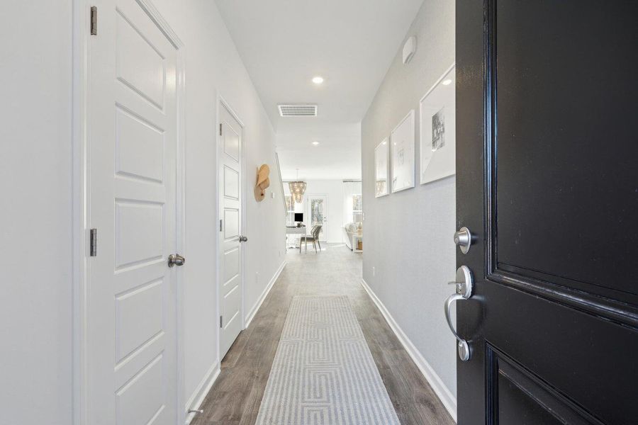 Furnished interior view inside a new home in Lindera Preserve at Cane Bay Plantation: Townhomes, Summerville (Image 8). Furnished interior view inside a new home in Lindera Preserve at Cane Bay Plantation: Townhomes, Summerville (Image 8).