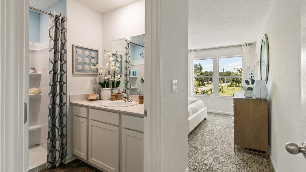 Representative furnished interior of a home built from the GREYSON by D.R. Horton in Hansen Creek, Jacksonville (Image 12).