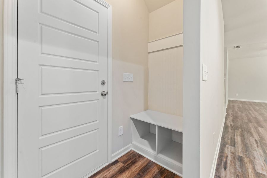 Mudroom with optional bench located off of the garage