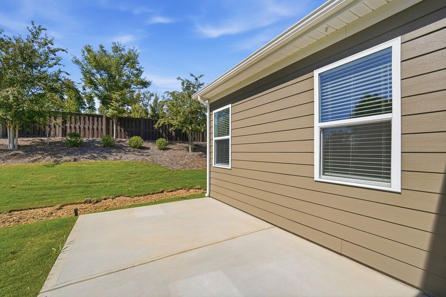 Exterior details and patio area of a home in Esplanade at Northgate, Indian Trail (Image 22).