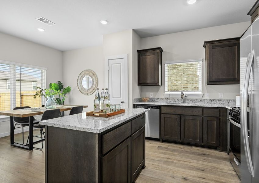 The dining room sits right off of the kitchen.