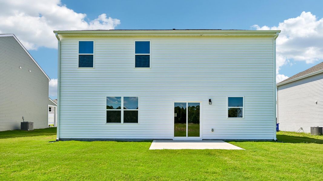 Exterior details and patio area of a home in Shahbain Reserve, Raeford (Image 17).