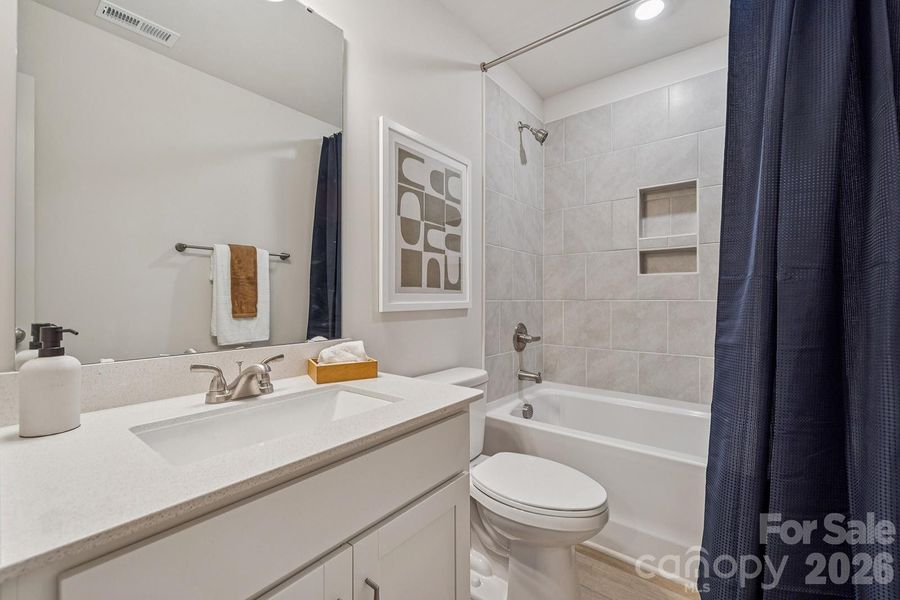 Example rendering Only - Home under construction with estimated completion in April or May.