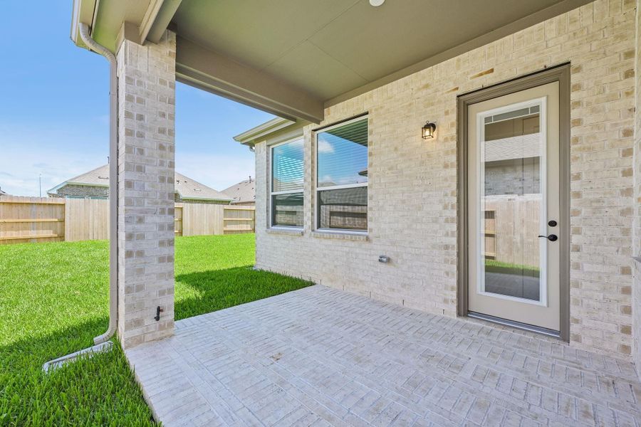 Exterior details and patio area of a home in Wood Leaf Reserve, Tomball (Image 4). Exterior details and patio area of a home in Wood Leaf Reserve, Tomball (Image 4).