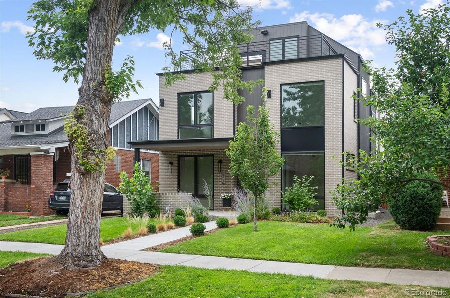 Front exterior of a new home in , Denver, CO, highlighting curb appeal (Image 25).