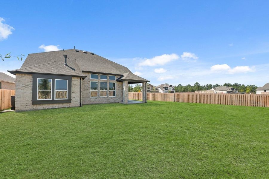 Front exterior of a new home in COLTON: 50ft. lots, Montgomery, TX, highlighting curb appeal (Image 16).