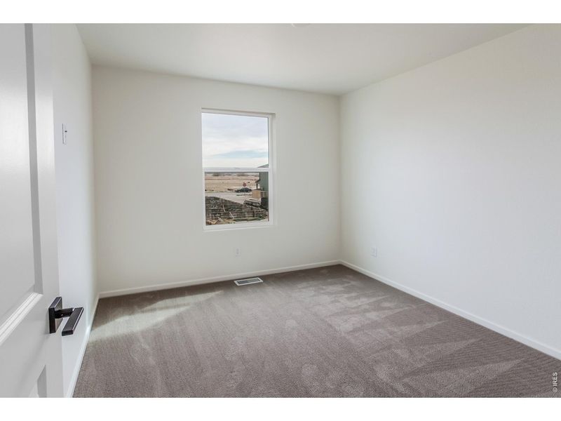 Spacious, unfurnished interior of a new home in Bloom Trailblazer Collection - Single Family Homes, Fort Collins (Image 33).