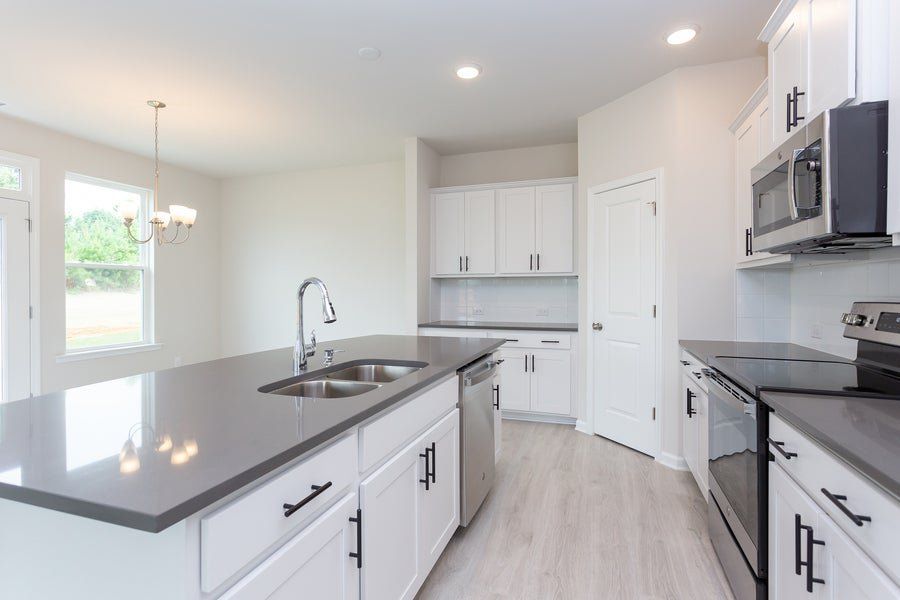 Representative furnished interior of a home built from the The Sycamore by Chesapeake Homes in Traditions at Carolina Forest, Myrtle Beach (Image 7).