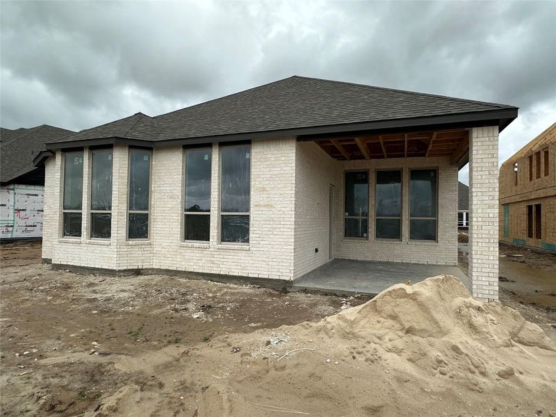 In-progress construction of a new home in Meridiana, Manvel, TX (Image 18).