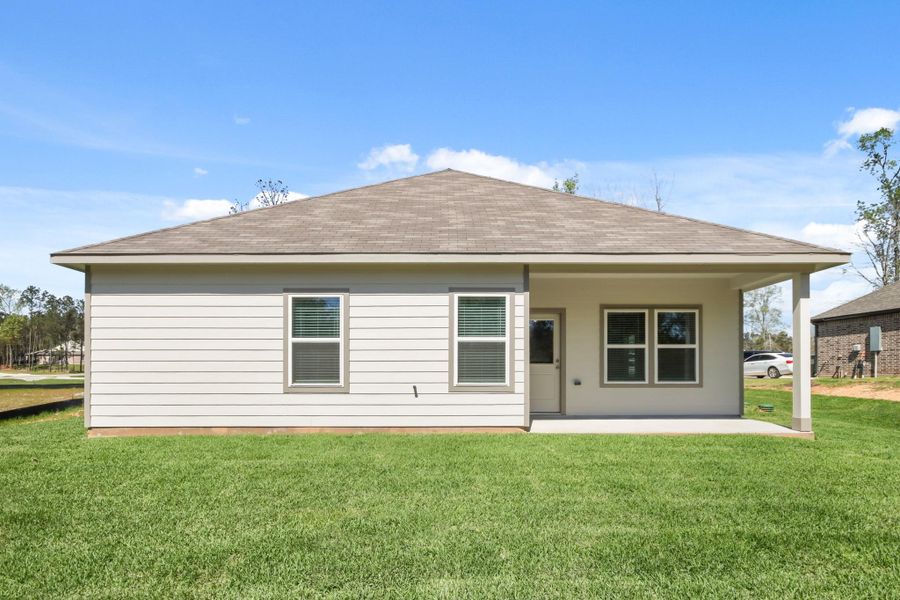 Exterior details and patio area of a home in Oakwood Ranch, Willis (Image 4).