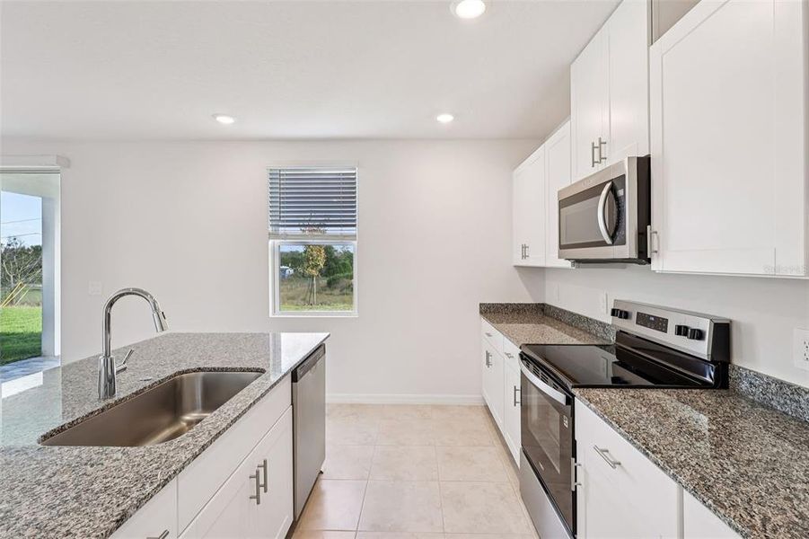 Furnished interior view inside a new home in Crosswinds - Signature Series, Haines City (Image 10).