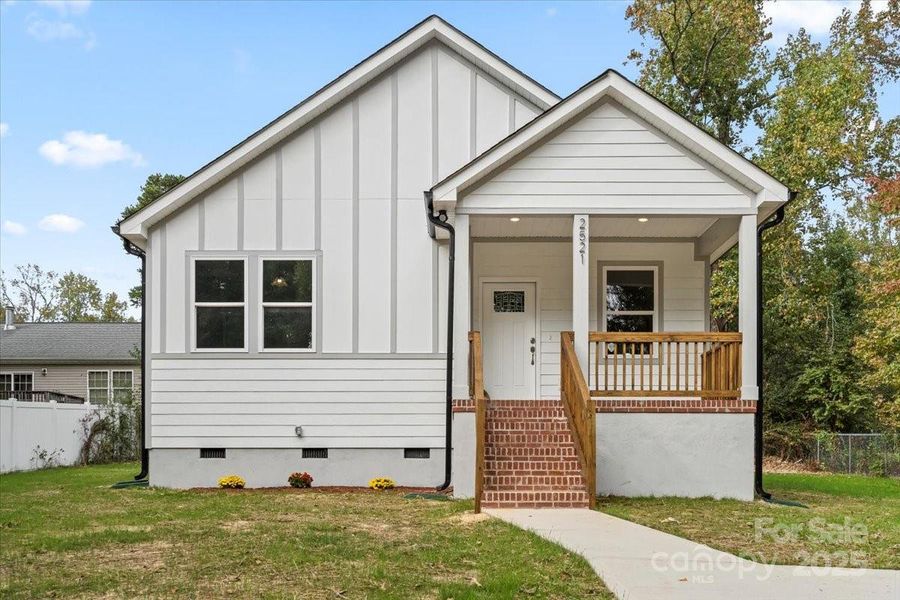 Front exterior of a new home in , Kannapolis, NC, highlighting curb appeal (Image 23). Front exterior of a new home in , Kannapolis, NC, highlighting curb appeal (Image 23).