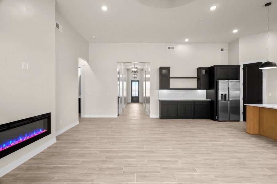 Representative furnished interior of a home built from the Pebble Beach- II by LEH. Homes in Verdancia, El Paso (Image 32).