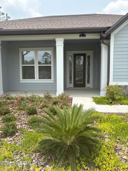 Front exterior of a new home in , Hilliard, FL, highlighting curb appeal (Image 9). Front exterior of a new home in , Hilliard, FL, highlighting curb appeal (Image 9).