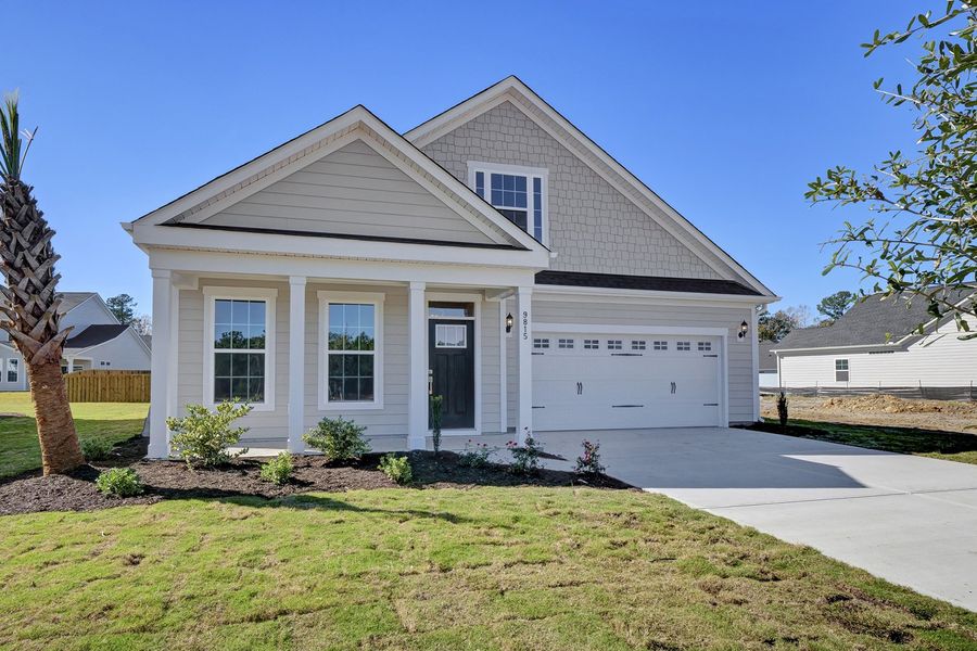 Front exterior of a new home in Grand Park, Leland, NC, highlighting curb appeal (Image 2).