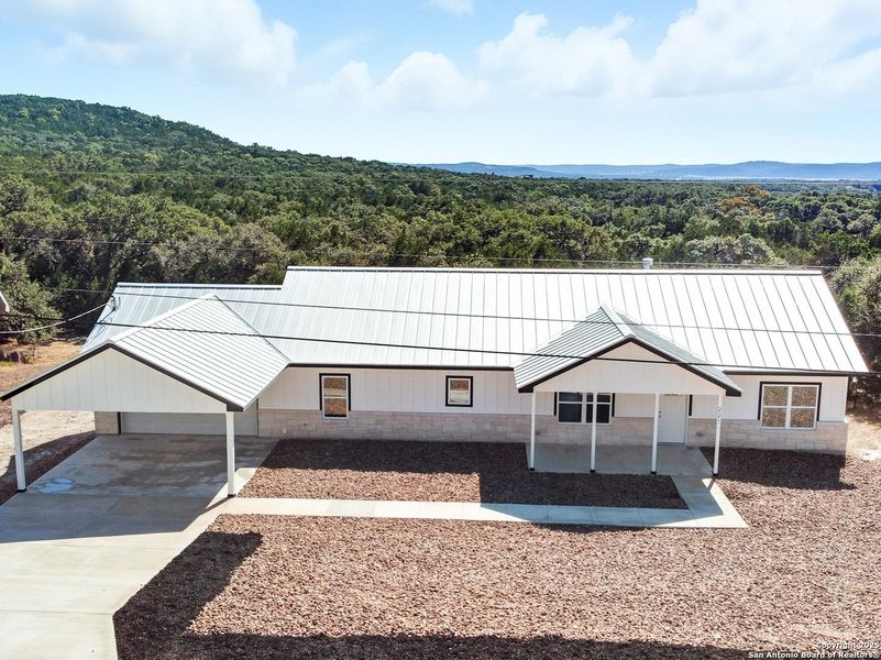 Exterior details and patio area of a home in , Lakehills (Image 22).