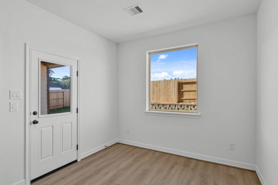 Breakfast area with door to back patio