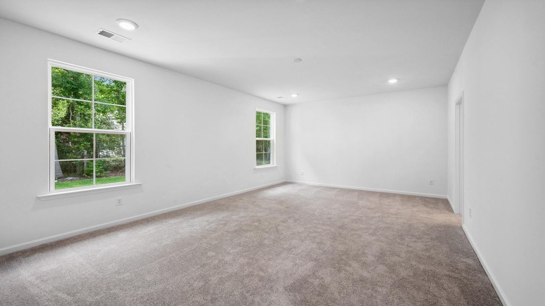Spacious, unfurnished interior of a new home in Creekside at Andrews, Summerville (Image 19).