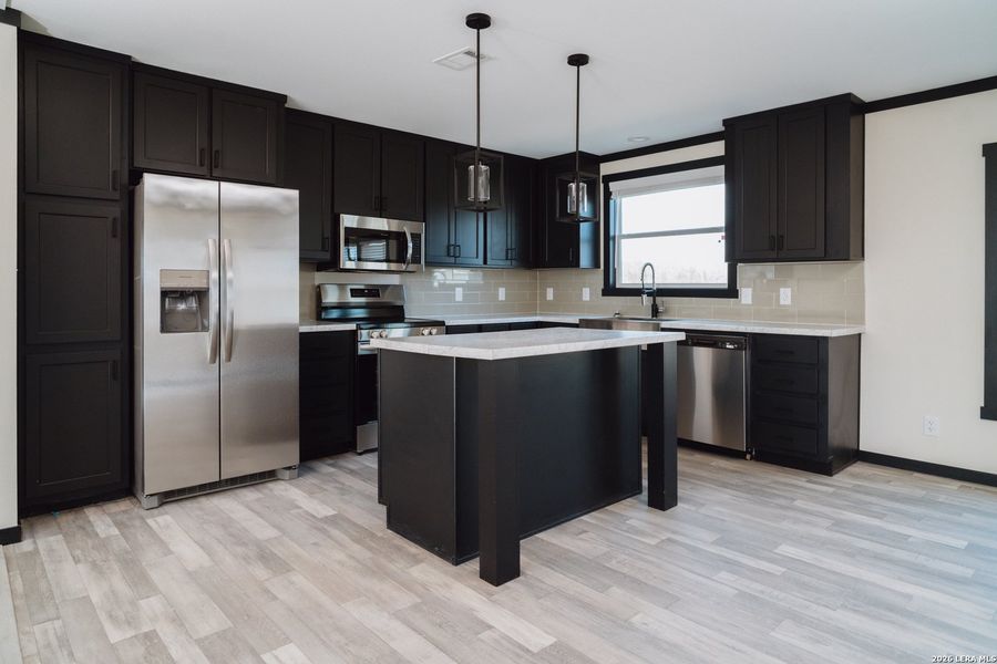 Furnished interior view inside a new home in , San Antonio (Image 4).