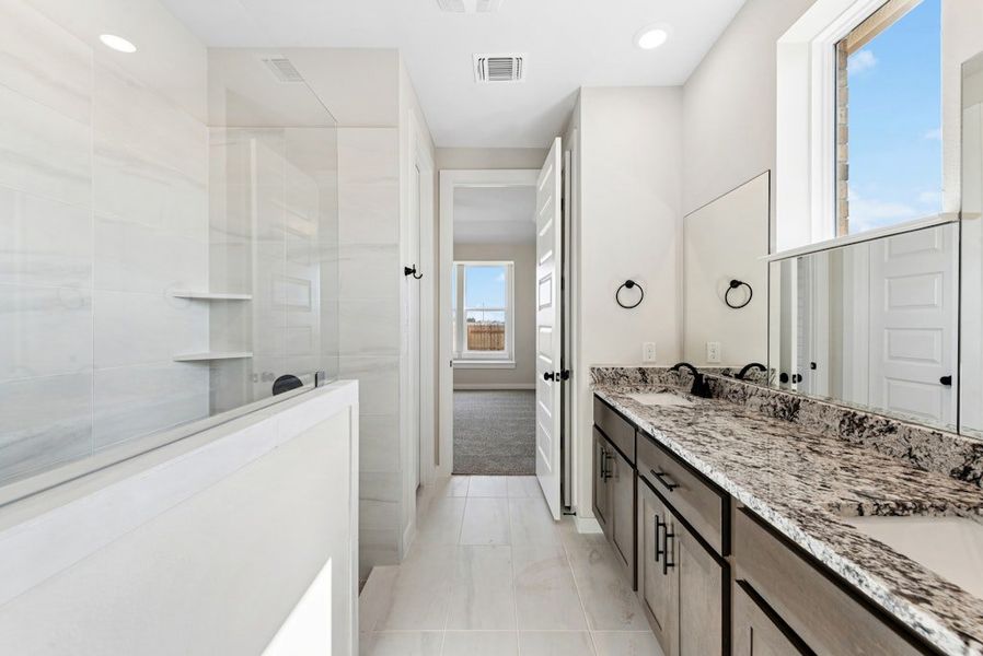Furnished interior view inside a new home in University Heights, Round Rock (Image 9).