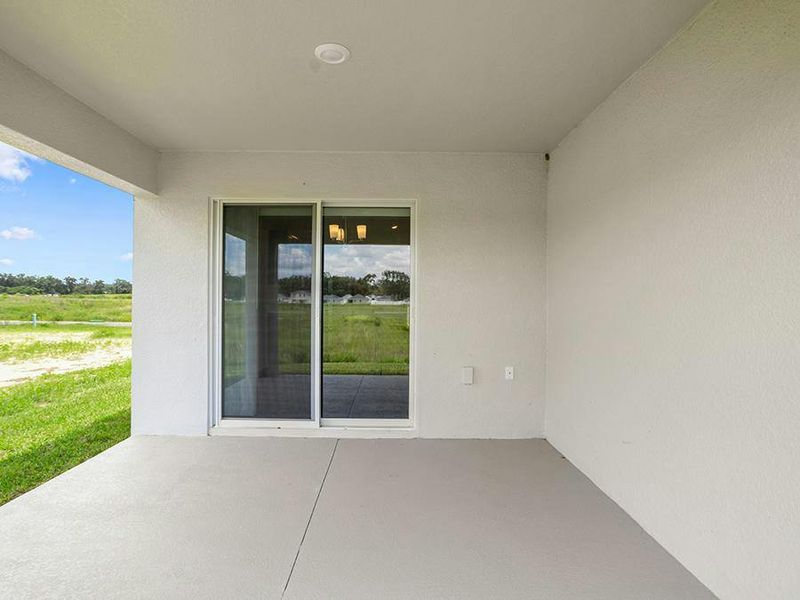 Your interior opens to outdoor living space on a covered lanai. Your interior opens to outdoor living space on a covered lanai.