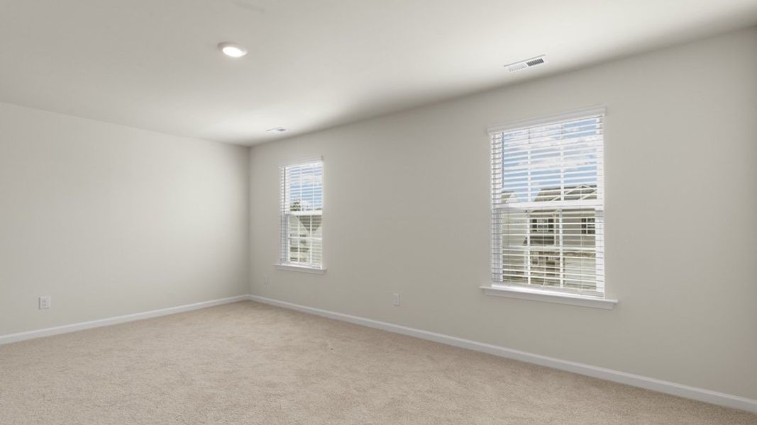 Spacious, unfurnished interior of a new home in The Grove at Matthews Landing, Fuquay Varina (Image 21).