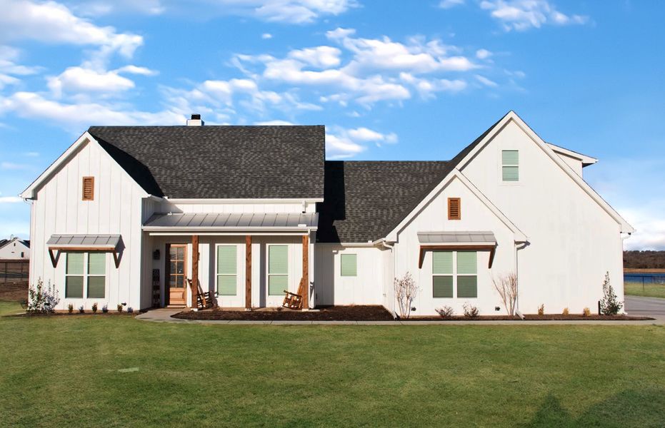 Representative exterior photo of a completed home built from the El Dorado by Trinity Classic Homes in The Reserve at Shadle, Poolville, TX (Image 1). Representative exterior photo of a completed home built from the El Dorado by Trinity Classic Homes in The Reserve at Shadle, Poolville, TX (Image 1).