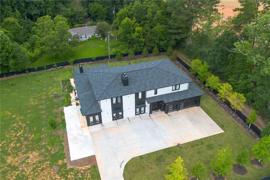 Front exterior of a new home in , Cumming, GA, highlighting curb appeal (Image 24). Front exterior of a new home in , Cumming, GA, highlighting curb appeal (Image 24).