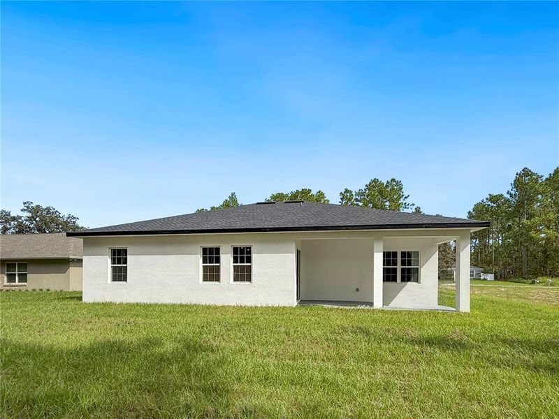Front exterior of a new home in , Ocala, FL, highlighting curb appeal (Image 19).