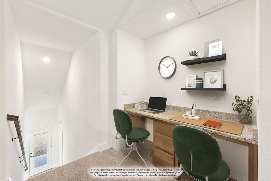 Built-in home office nook with granite desk, wood cabinets, two green chairs, and wall shelves Built-in home office nook with granite desk, wood cabinets, two green chairs, and wall shelves