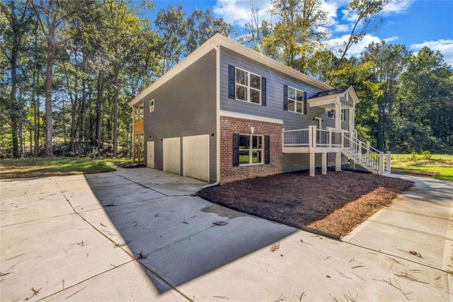 Front exterior of a new home in , Fayetteville, GA, highlighting curb appeal (Image 20).