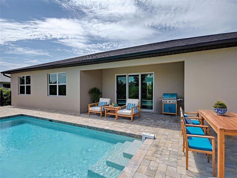Exterior details and patio area of a home in , Port Charlotte (Image 34).
