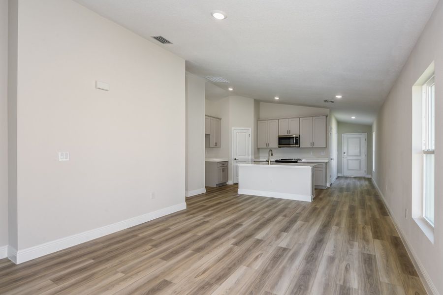 Representative unfurnished interior of a home built from the Bismark by Casa Fresca Homes in Cherrywood Preserve, Ocala (Image 19). Representative unfurnished interior of a home built from the Bismark by Casa Fresca Homes in Cherrywood Preserve, Ocala (Image 19).