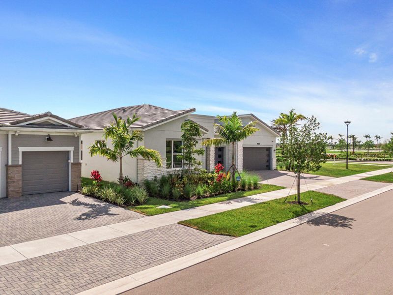 Front exterior of a new home in , Port St. Lucie, FL, highlighting curb appeal (Image 22).