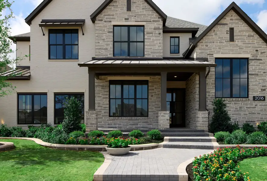 Front exterior of a new home in Furst Ranch, Argyle, TX, highlighting curb appeal (Image 4). Front exterior of a new home in Furst Ranch, Argyle, TX, highlighting curb appeal (Image 4).