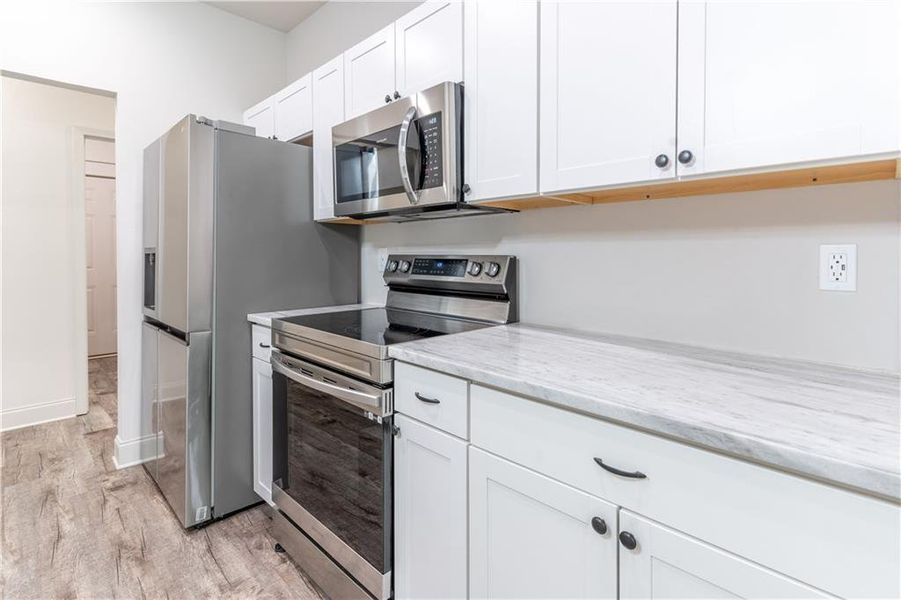 Furnished interior view inside a new home in , Commerce (Image 19).